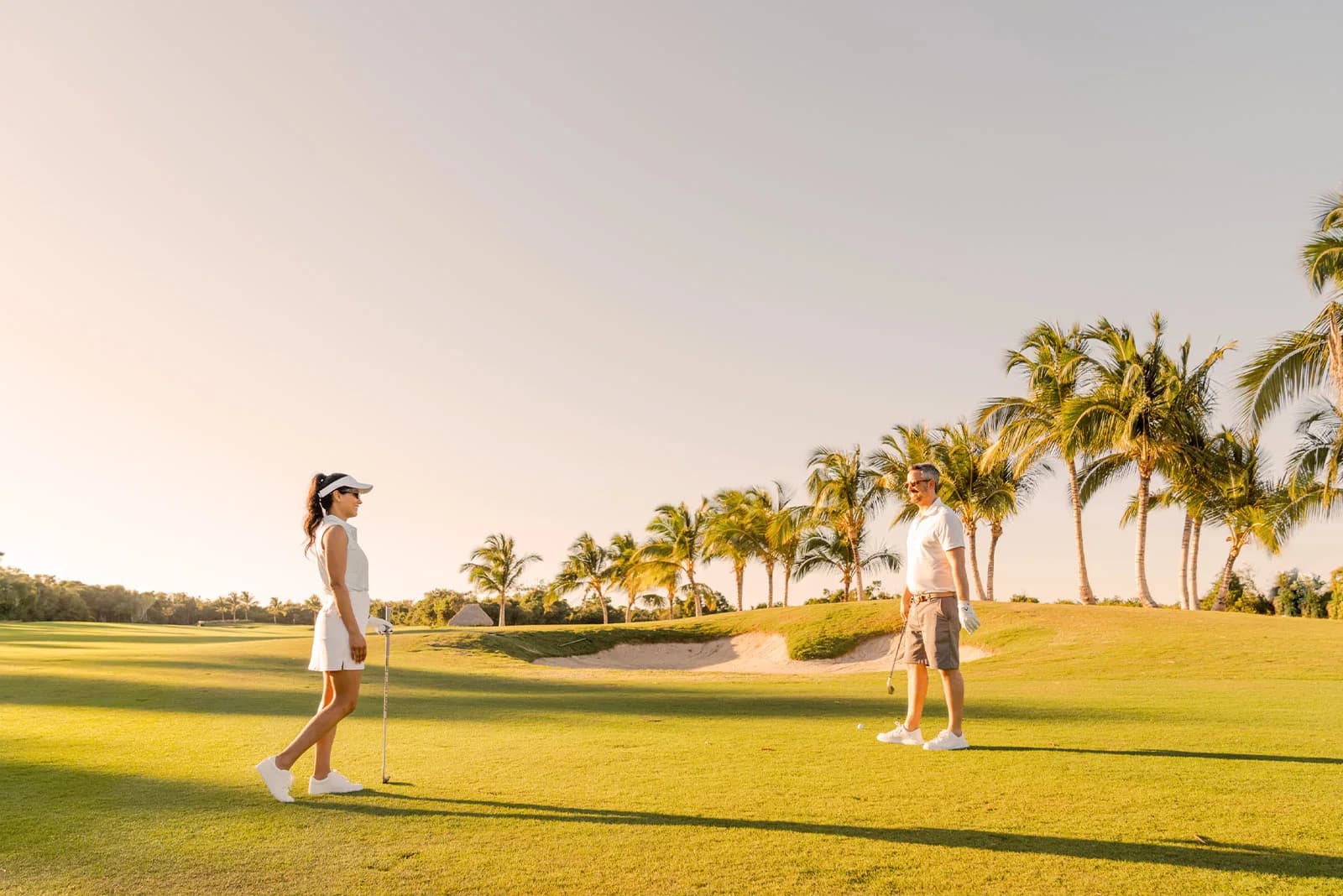 Sunset over a fairway at Hard Rock Golf Club at Cana Bay