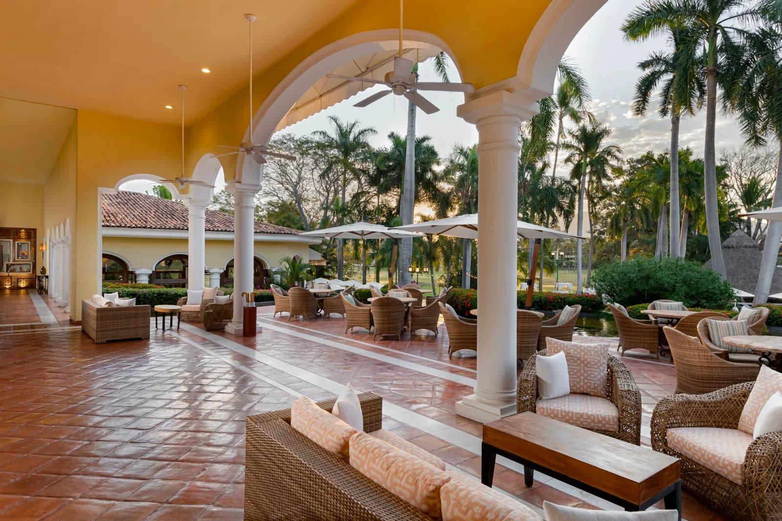 Terraces that open straight onto the fairway — the natural place to sit once the round is done.